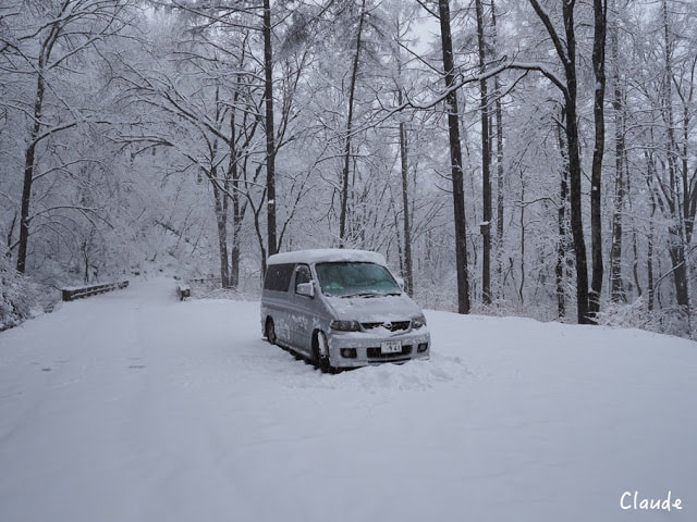 Mazda Bongo covered in snow
