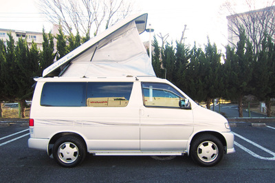 Mazda Bongo campervan outside roof up