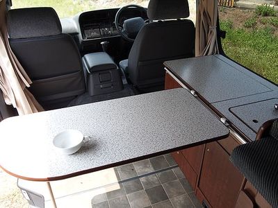Toyota Hiace Alfa inside table and kitchen 