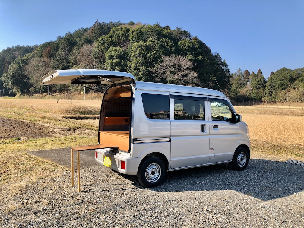 Wink Campervan - side view with an outside table
