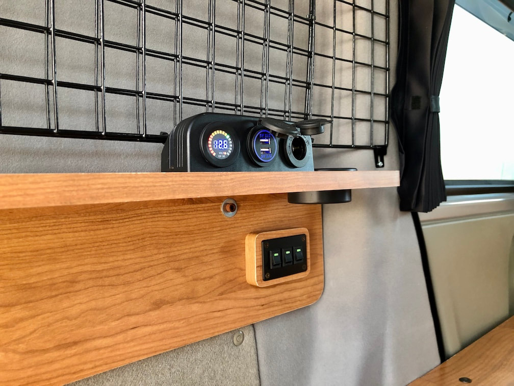 USB charging station with a sub battery indicator inside the wink campervan