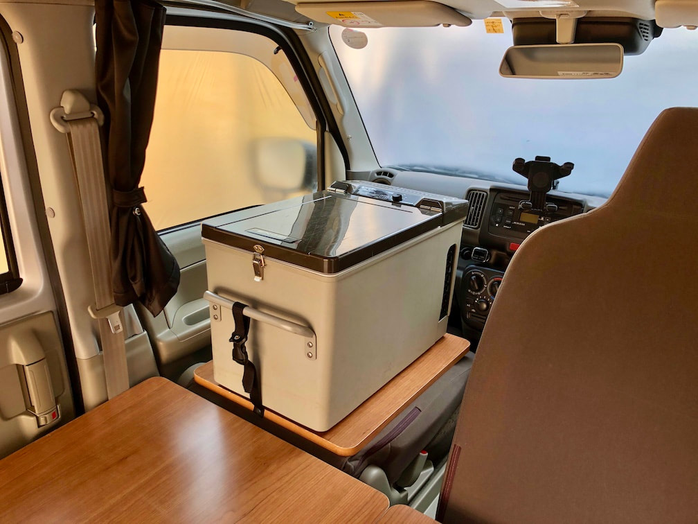 Fridge can be placed on the top of the passenger seat 